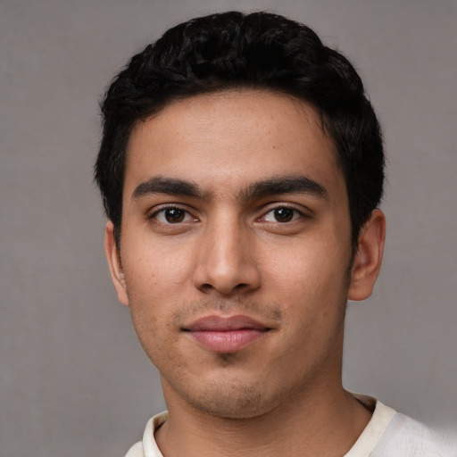 Neutral white young-adult male with short  black hair and brown eyes
