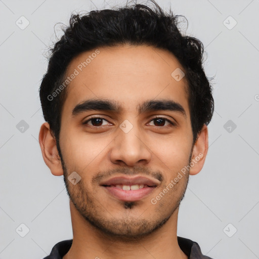 Joyful latino young-adult male with short  black hair and brown eyes