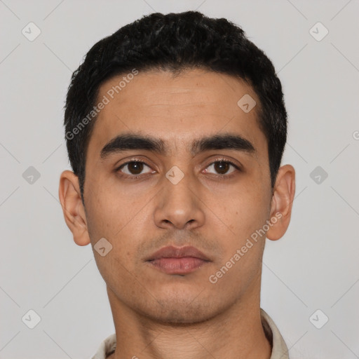 Neutral latino young-adult male with short  black hair and brown eyes