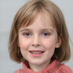 Joyful white child female with medium  brown hair and grey eyes