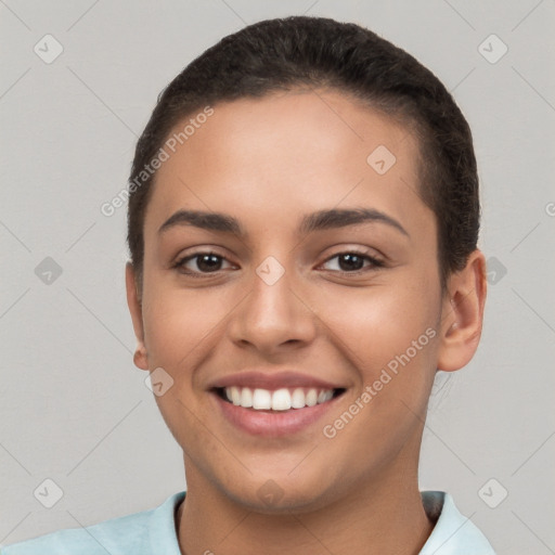 Joyful white young-adult female with short  brown hair and brown eyes