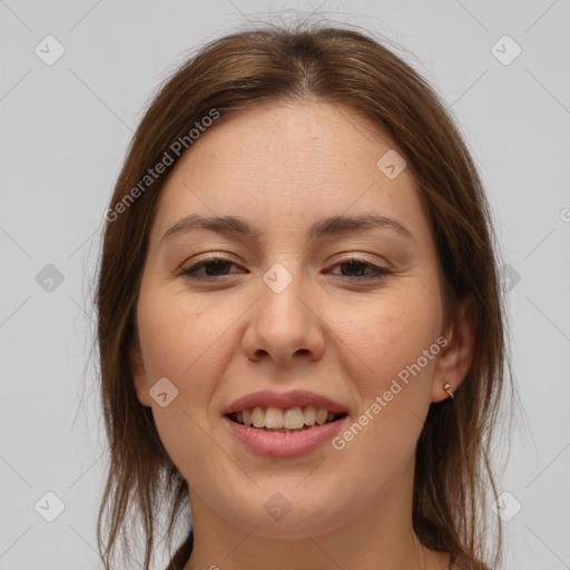 Joyful white young-adult female with medium  brown hair and brown eyes