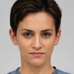 Joyful white young-adult female with short  brown hair and brown eyes