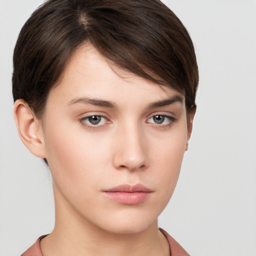 Neutral white young-adult female with short  brown hair and brown eyes