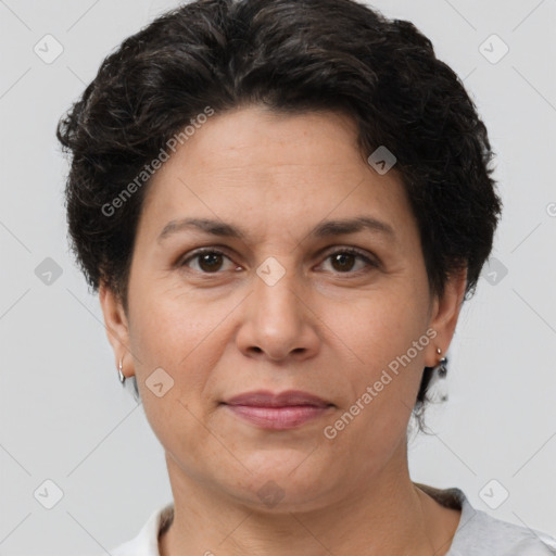 Joyful white adult female with short  brown hair and brown eyes