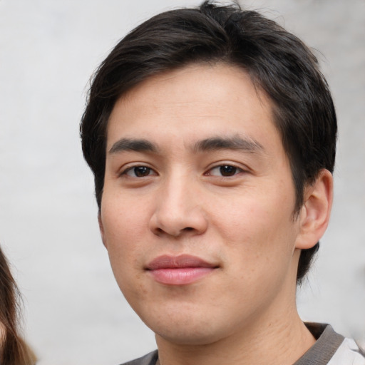 Neutral white young-adult male with medium  brown hair and brown eyes