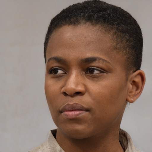 Neutral black young-adult female with short  brown hair and brown eyes