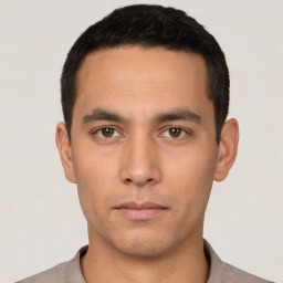 Neutral white young-adult male with short  black hair and brown eyes