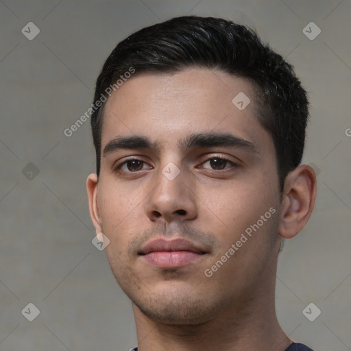 Neutral white young-adult male with short  black hair and brown eyes