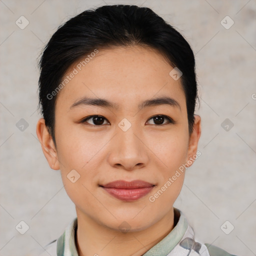 Joyful asian young-adult female with short  black hair and brown eyes