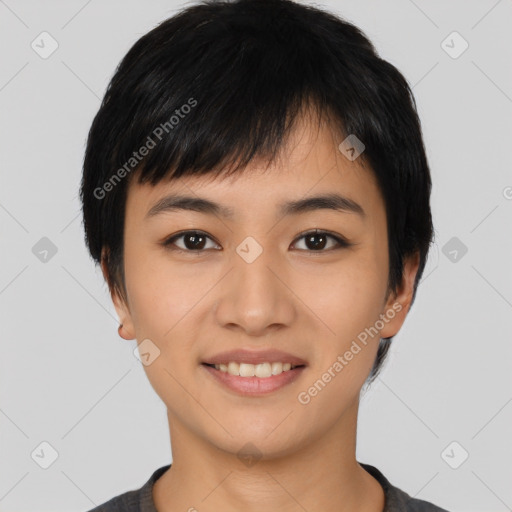 Joyful asian young-adult female with short  black hair and brown eyes