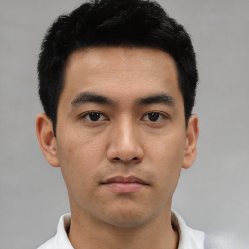 Neutral asian young-adult male with short  black hair and brown eyes