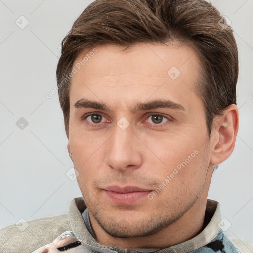 Neutral white young-adult male with short  brown hair and brown eyes