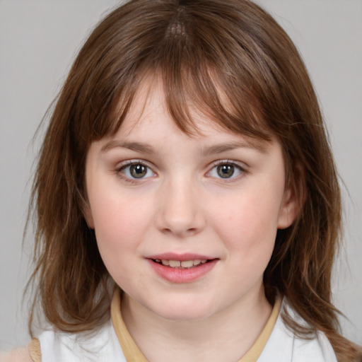 Joyful white child female with medium  brown hair and brown eyes