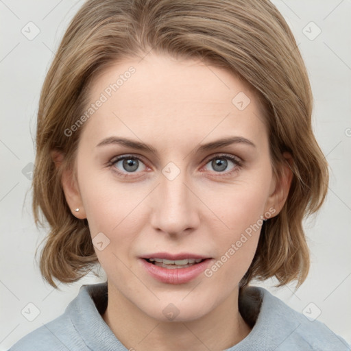 Joyful white young-adult female with medium  brown hair and blue eyes