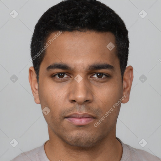Neutral latino young-adult male with short  black hair and brown eyes