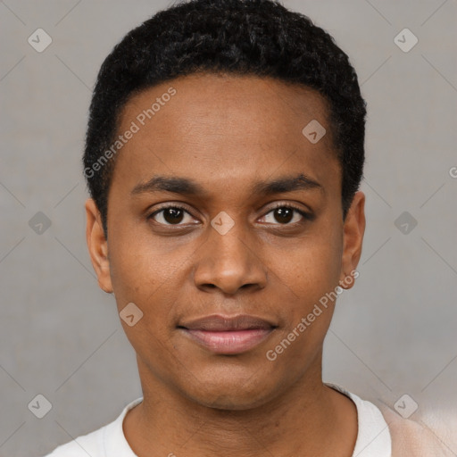 Joyful black young-adult male with short  black hair and brown eyes