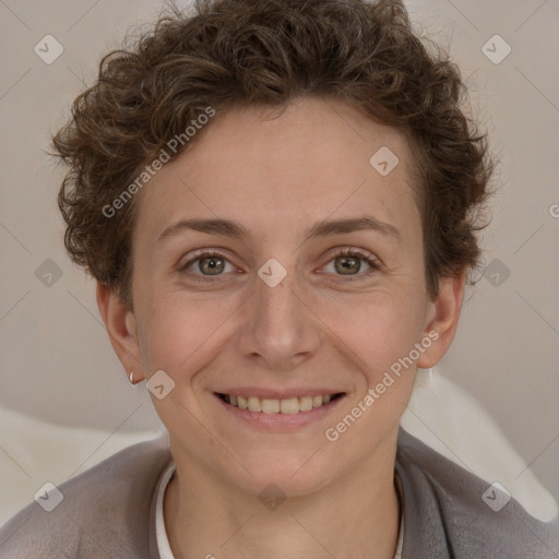 Joyful white adult female with short  brown hair and brown eyes