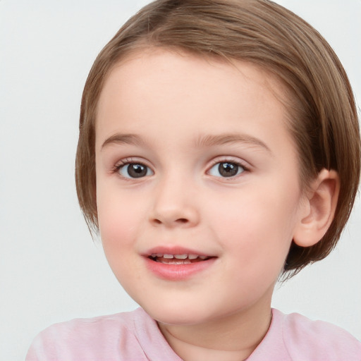 Joyful white child female with medium  brown hair and blue eyes