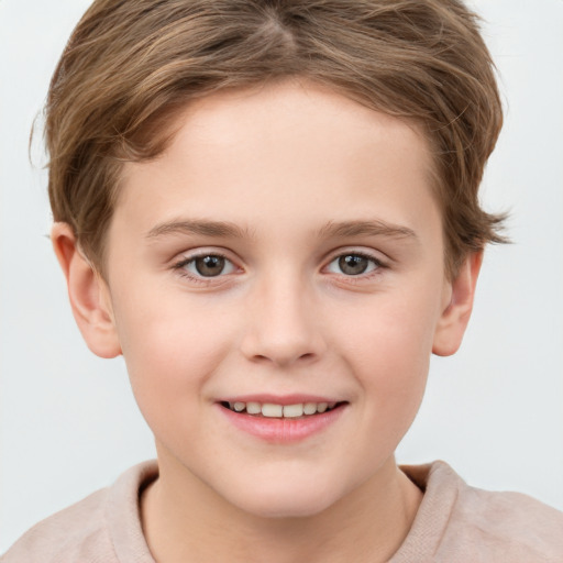 Joyful white child female with short  brown hair and grey eyes