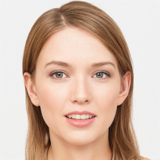 Joyful white young-adult female with long  brown hair and grey eyes