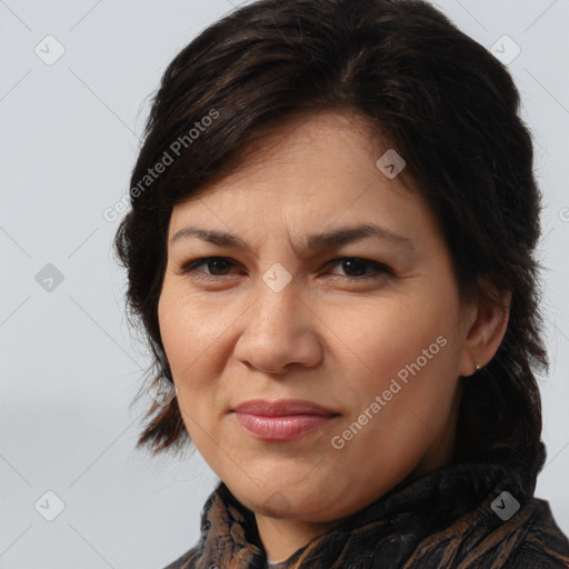 Joyful white adult female with medium  brown hair and brown eyes