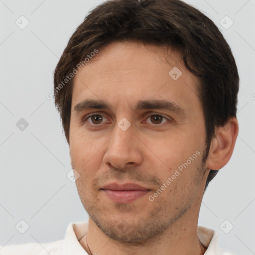 Joyful white young-adult male with short  brown hair and brown eyes