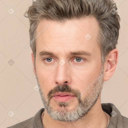 Neutral white adult male with short  brown hair and brown eyes