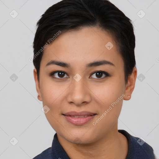 Joyful asian young-adult female with short  black hair and brown eyes