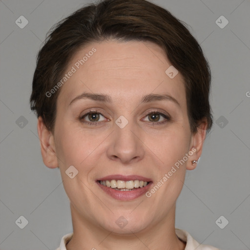 Joyful white adult female with short  brown hair and brown eyes