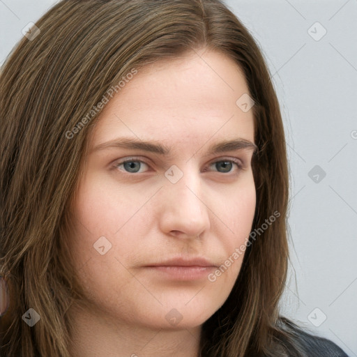 Neutral white young-adult female with long  brown hair and grey eyes