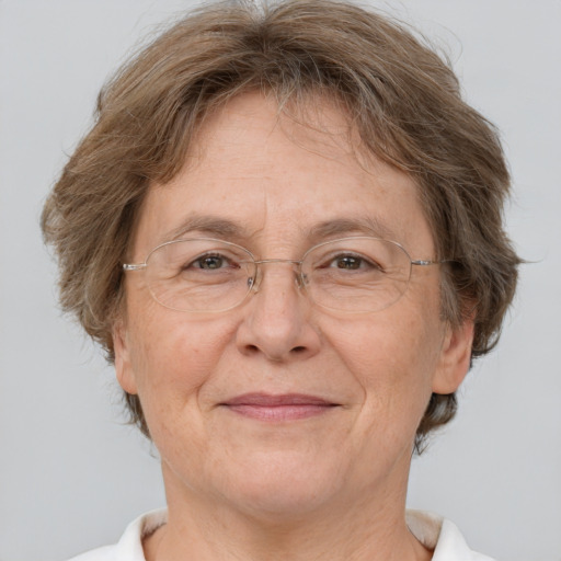 Joyful white middle-aged female with short  brown hair and brown eyes