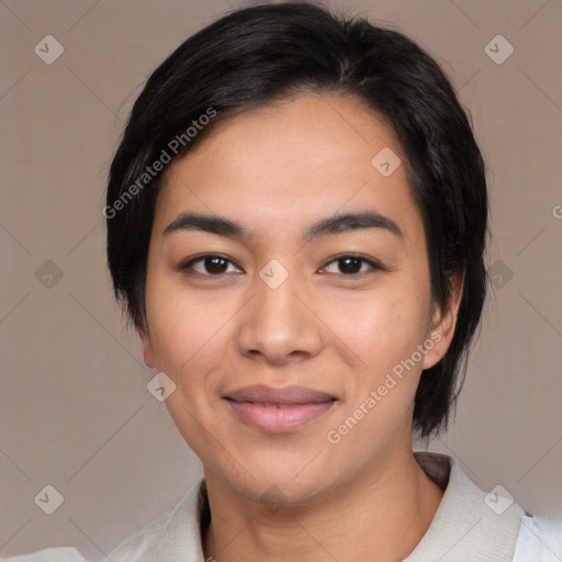 Joyful asian young-adult female with medium  black hair and brown eyes