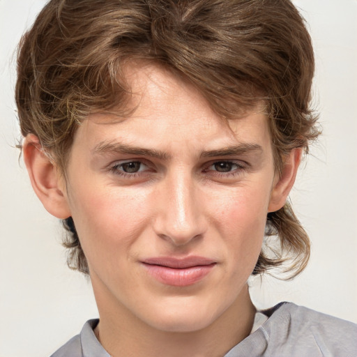 Joyful white young-adult male with medium  brown hair and brown eyes