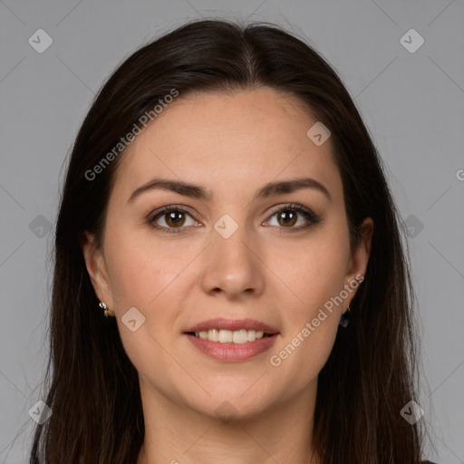 Joyful white young-adult female with long  brown hair and brown eyes