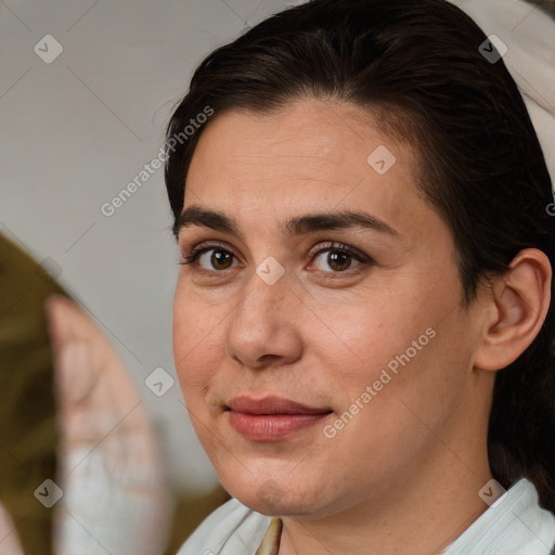 Joyful white adult female with medium  brown hair and brown eyes