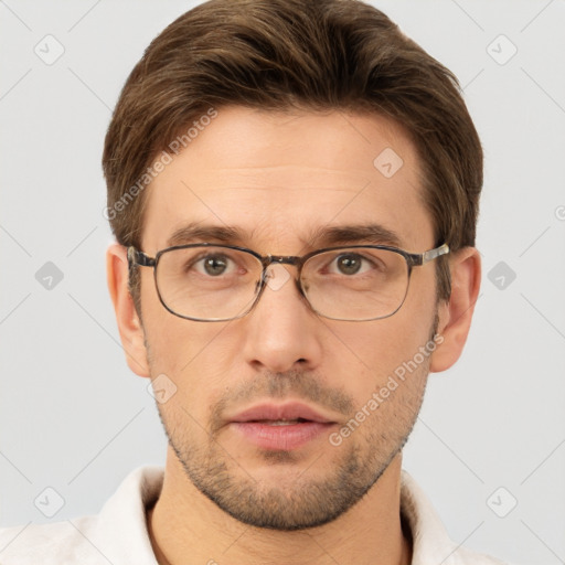 Neutral white adult male with short  brown hair and brown eyes