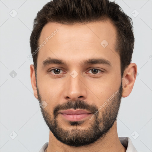 Neutral white young-adult male with short  brown hair and brown eyes