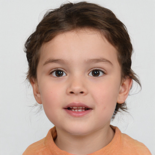 Joyful white child female with medium  brown hair and brown eyes