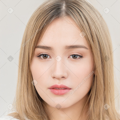 Neutral white young-adult female with long  brown hair and brown eyes