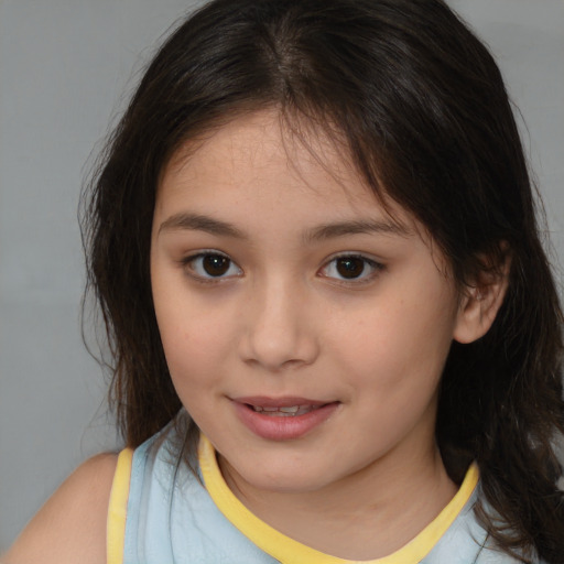 Joyful white child female with medium  brown hair and brown eyes