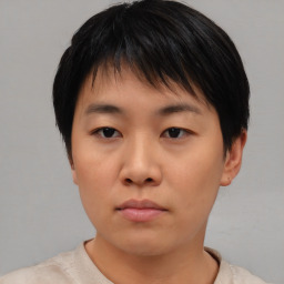 Neutral asian young-adult female with short  brown hair and brown eyes