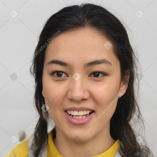 Joyful latino young-adult female with medium  brown hair and brown eyes