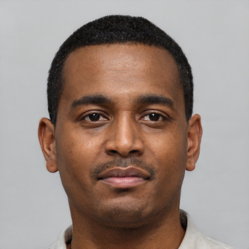 Neutral black young-adult male with short  black hair and brown eyes
