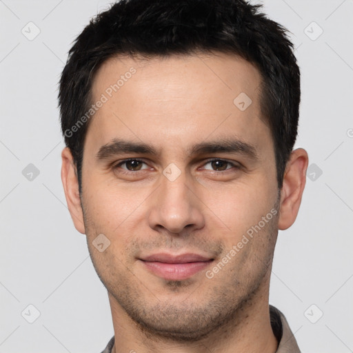 Joyful white young-adult male with short  brown hair and brown eyes