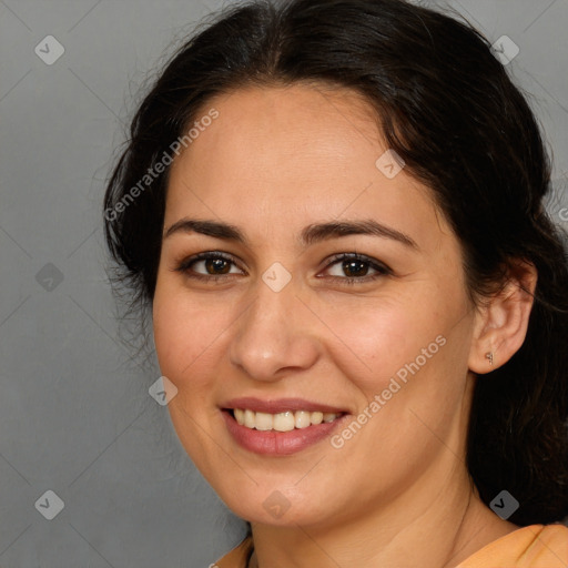 Joyful white young-adult female with medium  brown hair and brown eyes