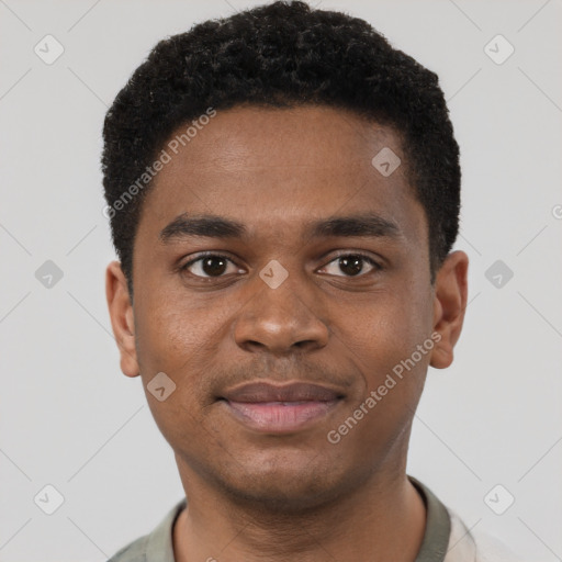 Joyful black young-adult male with short  brown hair and brown eyes