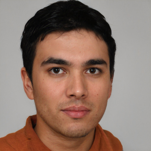 Neutral asian young-adult male with short  brown hair and brown eyes