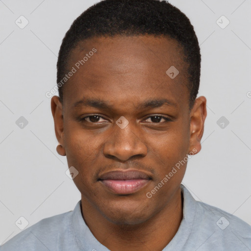 Joyful black young-adult male with short  brown hair and brown eyes