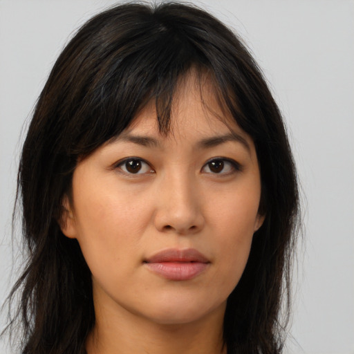 Neutral asian young-adult female with long  brown hair and brown eyes